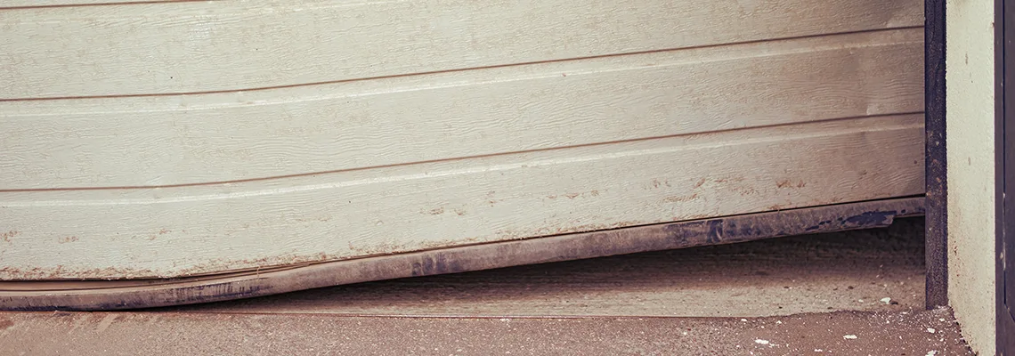 Repair Tilted Overhead Garage Door in Rock Island, IL