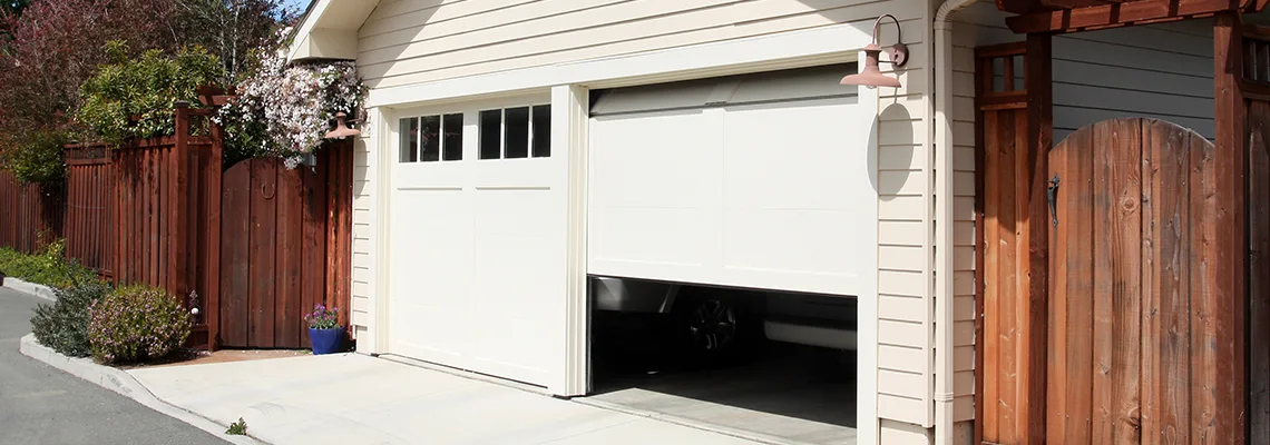 Fix Metal Garage Door Jerking in Rock Island, Illinois